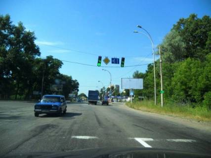 Билборд A в Бровары, 6х3  м. Бровари, вул. Київська, навпроти повороту на вул. Лісова, в'їзд в м. Бровари, за 120м до ресторану "У лісі", за 200м до повороту на вул. Металургів, за 310м до ТРЦ "Термінал" та магазину "МегаМаркет", за 310м до АЗС "КЛО" фото 1