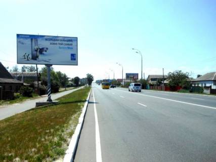 Билборд B в Бровары, 5,9х2,9  вул. Київська, 72, за 100м до автобусної зупинки, за 540м до перехрестя з вул. Євгенія Зеленського, через 270м після повороту на вул. Красницького повіту (кол. Сєрова) та магазину "Фора" фото 1