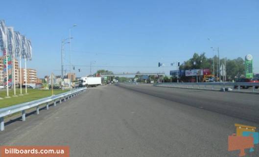 Билборд A в Ходосовке, 12х3  Дніпровське шосе, траса Н-01 "Київ-Знам'янка", км 23+650 ліво, поворот на с. Ходосівку, біля АЗС UPG, через 150м після ТЦ "МегаМаркет", лівий фото 1