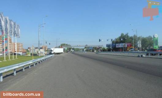 Билборд A в Ходосовке, 12х3  Дніпровське шосе, траса Н-01 "Київ-Знам'янка", км 23+650 ліво, поворот на с. Ходосівку, біля АЗС UPG, через 150м після ТЦ "МегаМаркет", правий фото 1