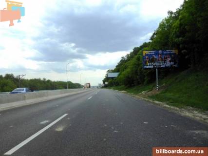 Билборд A в Київських трасах, 6х3  Дніпровське шосе, траса Н-01 "Київ-Знам'янка", км 24+150 право, через 500м після повороту на с. Ходосівку та АЗС UPG, через 150м після ТЦ "МегаМаркет", за 100м до ТЦ "Аракс" фото 1