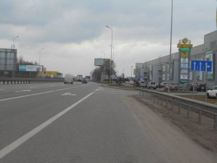 Билборд B в Ходосовке, 6х3  Дніпровське шосе, траса Н-01 "Київ-Знам'янка", км 23+850 ліво, через 200м після повороту на с. Ходосівку та АЗС UPG, навпроти ТЦ "МегаМаркет" фото 1