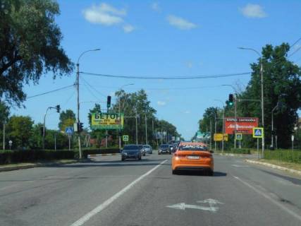 Білборд, Бігборд (Борд)  A у Бучі, 6х3  м. Буча, траса М-07 "Київ-Ковель", км 30+000 право, вул. Нове Шосе, біля ТЦ Модуль, поворот на парковку магазину Епіцентр, через 400м після ТРЦ Avenir Plaza, за 150м до АЗС WOG Фото 1