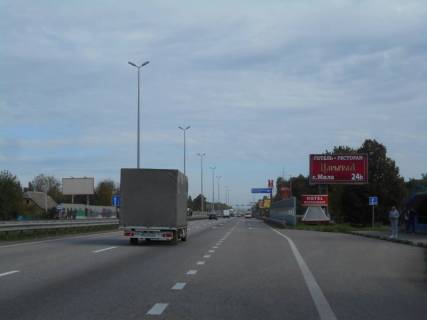 Билборд A в Миле с. Мила, траса М-06 Київ-Чоп (Житомир), км 25+770 ліво, біля автобусної зупинки, перед заміським комплексом "Царьград", перед поворотом на Петрушки, через 400м після магазину "Фора" фото 1