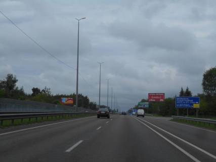 Білборд, Бігборд (Борд)  A у Капітанівке, 6х3  с. Капітанівка, траса М-06 "Київ-Чоп" (Житомир), км 24+280 право, за 540м до АЗС АМІС та повороту на Ворзель, за 400м до Мега Маркету Фото 1