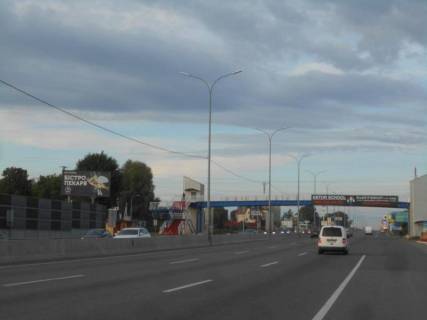 Билборд B в Чабаны, 6х3  с. Чабани, траса М-05 Київ-Одеса, км 16+485 ліво, біля автобусної зупинки, навпроти заїзду на АЗС Marshal, через 405м після АЗС UPG, за 80м до повороту на вул. Кірова фото 1