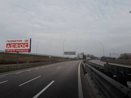 Білборд, Бігборд (Борд)  B у Обухові, 6х3  Дніпровське шосе, траса Н-01 "Київ-Знам'янка", км 43+220 право, розв'язка на м. Обухів та м. Українка, виїзд з м. Обухів в сторону м. Київ Фото 1