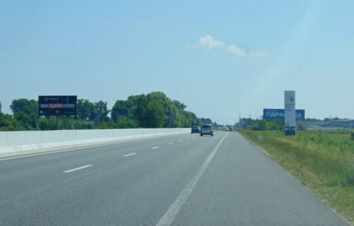 Білборд, Бігборд (Борд)  B у Бровари, 6х3  м. Бровари, траса М-01 "Київ-Чернігів-Нові Яриловичі", км 22+550 ліво, об'їзд м. Бровари, за 750м до перетину вул. Переяславський Шлях та вул. Лагунової, ресторану "Петрівський Бровар" та АЗС ОККО, через 1.7км після повороту на вул. Анатолія Фото 1