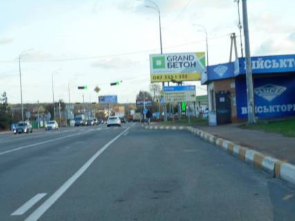 Білборд, Бігборд (Борд)  A у Гостомелі, 6х3  м. Гостомель-м. Ірпінь, вул. Шевченка-вул. Свято- Покровська (навпроти №20-А), траса М-07, км 23+650 ліво, перед Ірпінським кільцем, біля Сіті Маркету, зупинка Фото 1