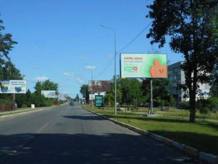 Билборд A в Гостомеле, 6х3  м. Гостомель, вул. Свято-Покровська, 64Б, за 200м до автобусної зупинки, навпроти парку "Щасливий" фото 1