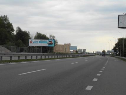 Білборд, Бігборд (Борд)  B у Ходосівці, 12х3  Дніпровське шосе, траса Н-01 "Київ-Знам'янка", км 23+950 ліво, через 300м після повороту на с. Ходосівку та АЗС UPG, навпроти ТЦ "МегаМаркет", лівий Фото 1