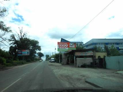 Білборд, Бігборд (Борд)  A у Крюковщині, 6х3  с. Крюківщина, вул. Одеська, за 100м до будівельного маркету "Домосвіт", за 500м до ЖК "Молодіжне містечко", за 950м до ЖК "Оранж Парк" та розвилки з вул. Прикордонна, напрямок в с. Гатне Фото 1