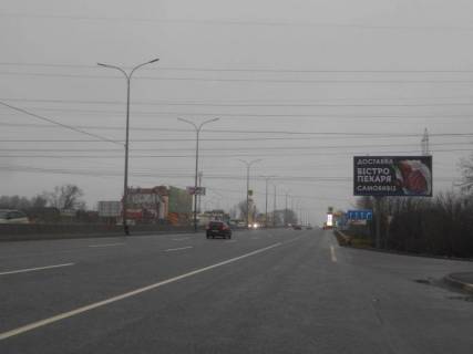 Билборд A в Чабаны с. Чабани, траса М-05 Київ-Одеса, км 16+630 право, заїзд до АТБ Маркету, біля автобусної зупинки, через 170м після заїзду на  АЗС Marshal, за 160м до АЗС КЛО фото 1