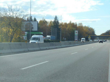 Білборд, Бігборд (Борд)  B у Калинівка, 6х3  смт. Калинівка, траса М-05 Київ-Одеса, км 30+000 ліво, за 200м до АЗС АМІК, за 350м до автобусної зупинки "ст. Зоря", за 750м до повороту на вул. Залізнична Фото 1