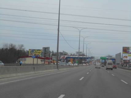 Билборд B в Чабаны с. Чабани, траса М-05 Київ-Одеса, км 16+630 право, заїзд до АТБ Маркету, біля автобусної зупинки, за 170м до заїзду на  АЗС Marshal, через 160м після АЗС КЛО фото 1