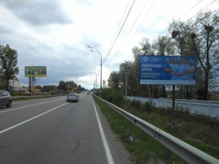 Білборд, Бігборд (Борд)  A у Нових Петрівцях Траса "Київ-Іванків-Овруч", Р-02 км 20+ 500 ліво, с. Нові Петрівці,  поворот на на комплекс "Межигір'я" Фото 1