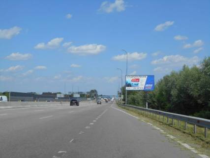 Білборд, Бігборд (Борд)  A у Глевасі, 6х3  смт. Глеваха, траса М-05 Київ-Одеса, км 26+030 ліво, біля розв'язки на м. Васильків, за 55м до автобусної зупинки Фото 1