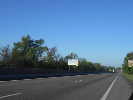 Білборд, Бігборд (Борд)  B у Калинівка, 6х3  смт. Калинівка, траса М-05 Київ-Одеса, км 29+650 ліво, через 650м після повороту на вул. Вокзальна та АЗС КЛО, за 850м до АЗС АМІК Фото 1