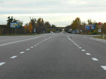 Білборд, Бігборд (Борд)  A у Обухові, 6х3  м. Обухів, вул. Жовтнева, траса Н-01 "Київ-Знам'янка", розв'язка на м. Кагарлик Фото 1