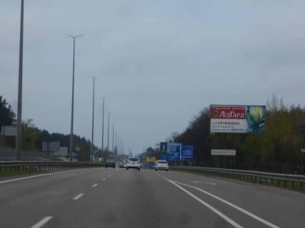 Билборд A в Капітанівке, 6х3  с. Капітанівка, траса М-06 "Київ-Чоп" (Житомир), км 24+340 право, за 480м до АЗС АМІС та повороту на Ворзель, за 340м до Мега Маркету фото 1