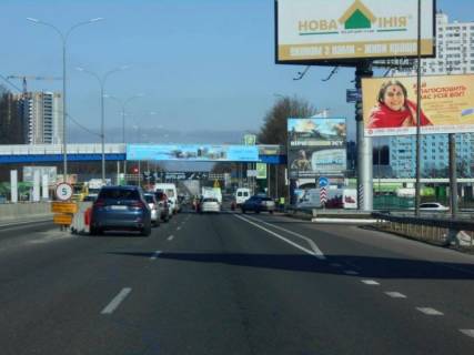 Білборд, Бігборд (Борд)  A у Гатному, 6х3  с. Чабани, початок проспекту Академіка Глушкова, траса М-05 Київ-Одеса, км 13+930 ліво, навпроти магазину АТБ, біля Нової Лінії, за 130м до АЗС ОККО, верх Фото 1