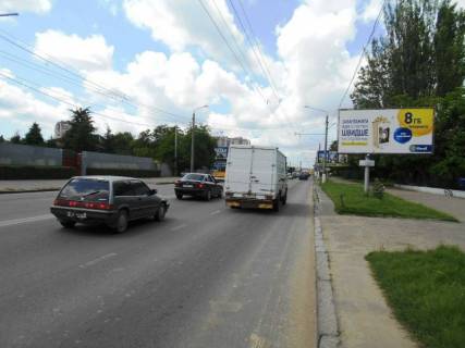 Билборд A в Одессе, 3х6  вул.Комарова,10 - автосалон "NN Auto" (А), з центру фото 1