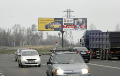 Білборд, Бігборд (Борд)  A у Київських трасах, 3х6  Окружна Обухіва/перекрестя: Київ-Украінка-1,5км до азс Сокар (А) лівий - на Київ Фото 1